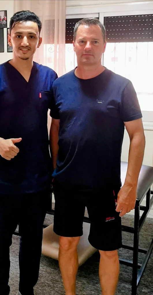 Ayyoub Ouchen helping a local patient get pain-free at CHIRO HEALTH CENTER Agadir